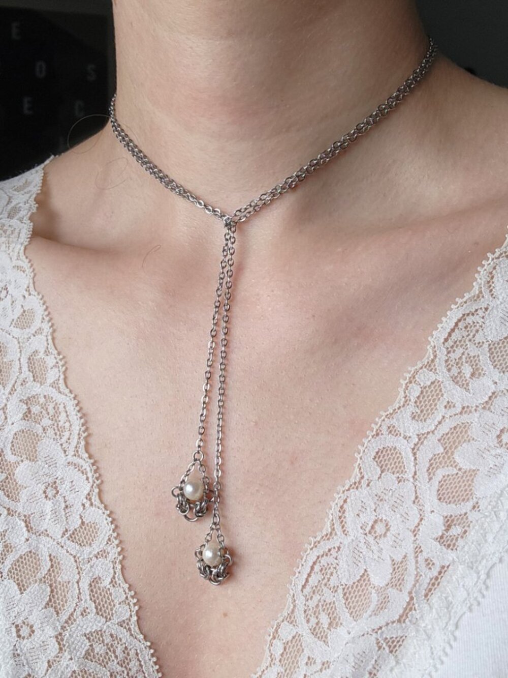 Long silver and pearl necklace